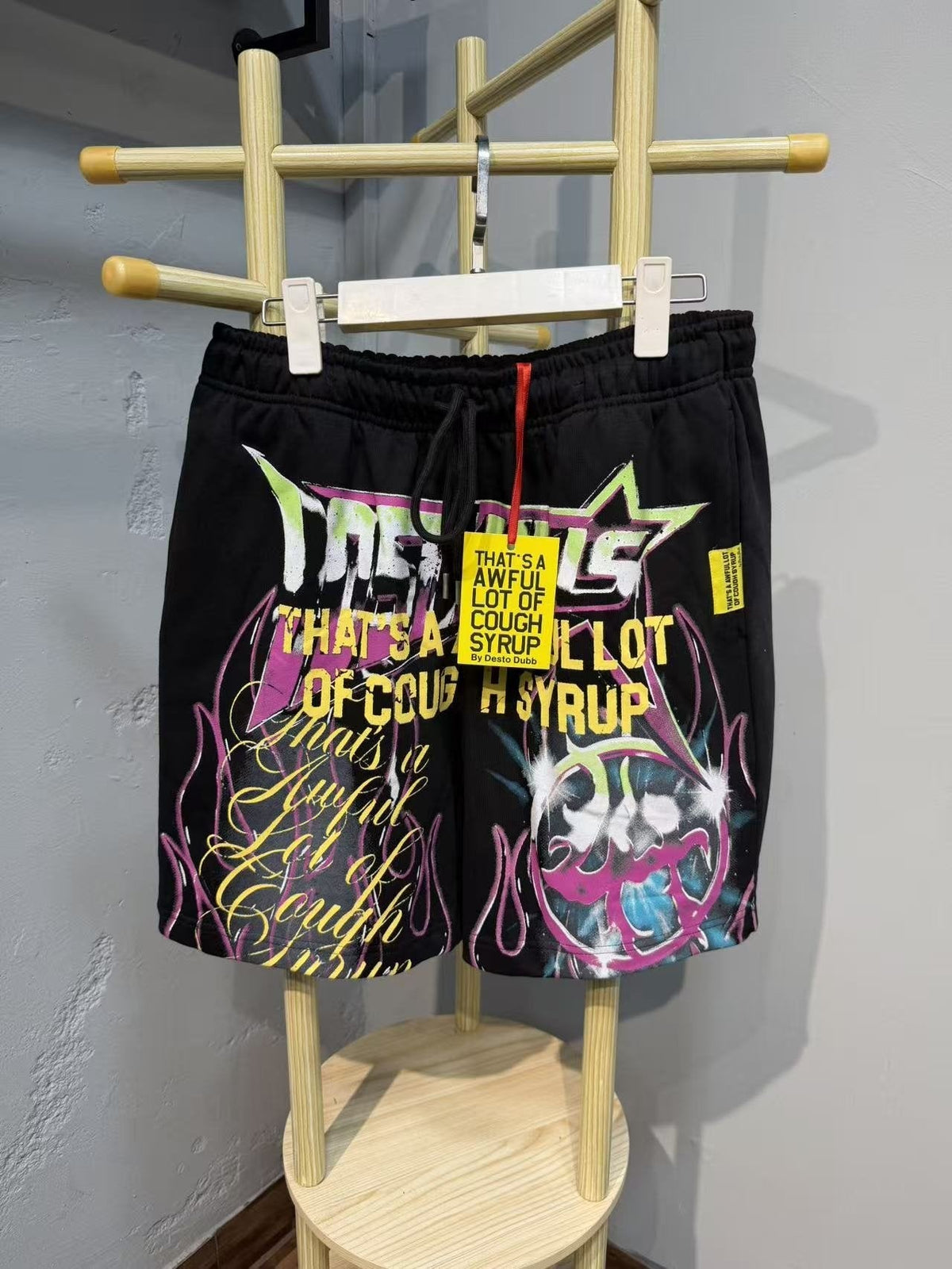 THAT'S A AWFUL LOT OF COUGH SYRUP Black Graphic Drawstring Shorts ¡ª front
